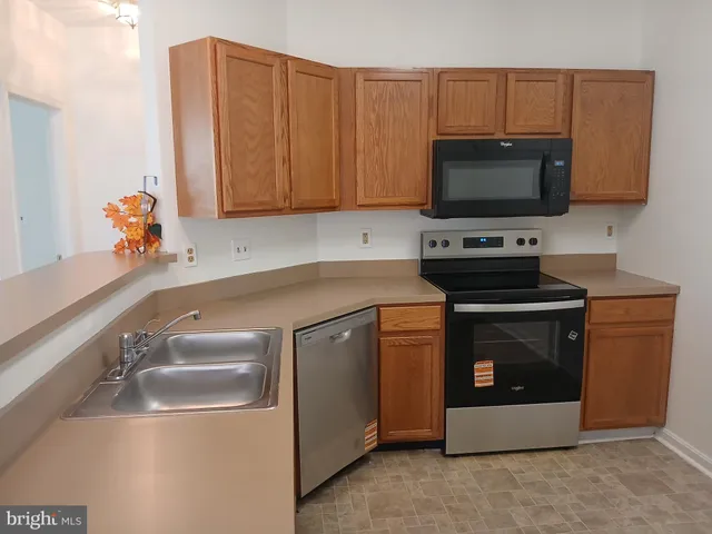 $221,000 | 7201 Bogley Road, Unit 203, Windsor Mill, MD 21244