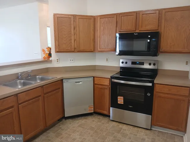 $221,000 | 7201 Bogley Road, Unit 203, Windsor Mill, MD 21244