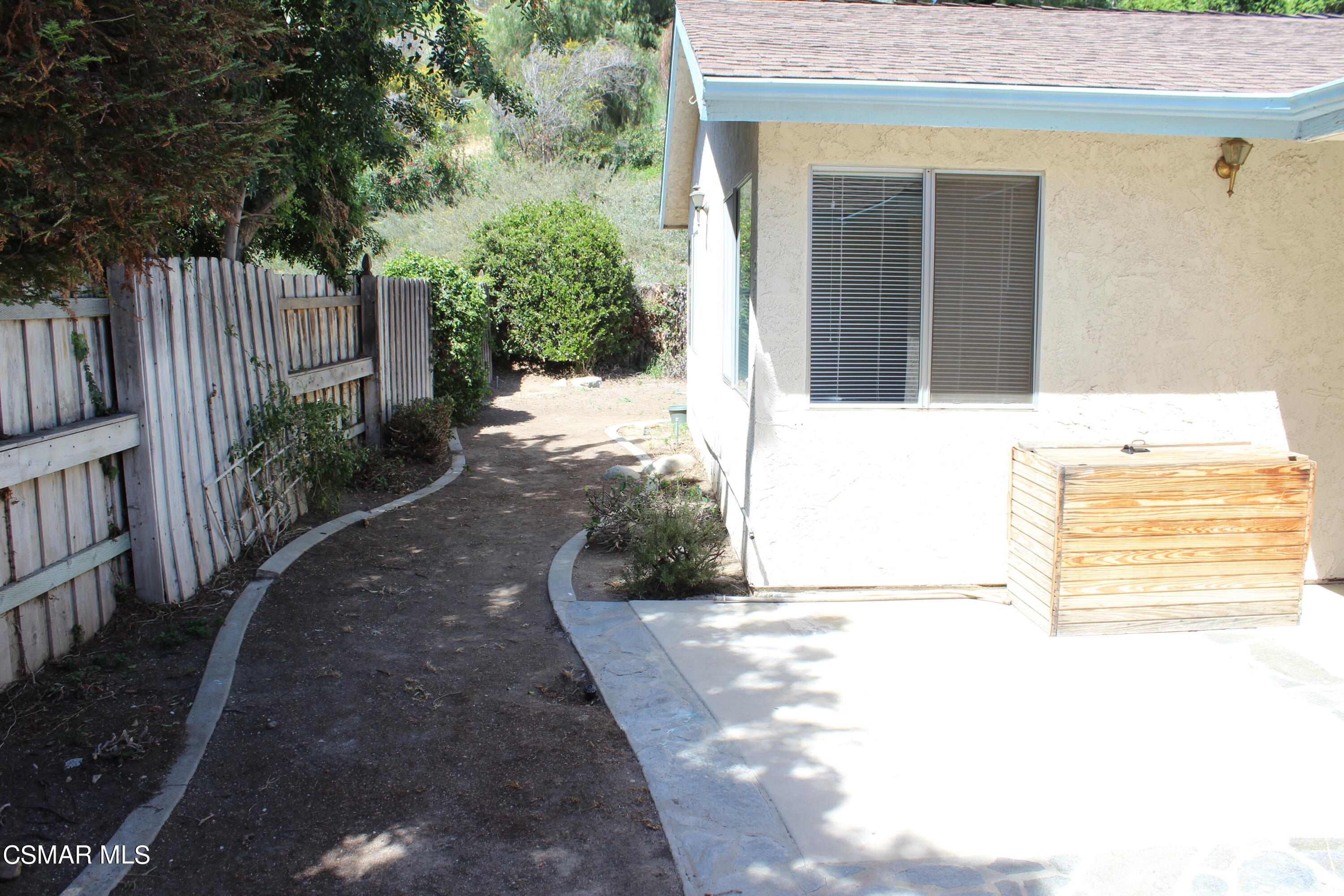 15063 Reedley Street Moorpark, CA 93021 - Photo 15 of 18 a view of a back yard of the house