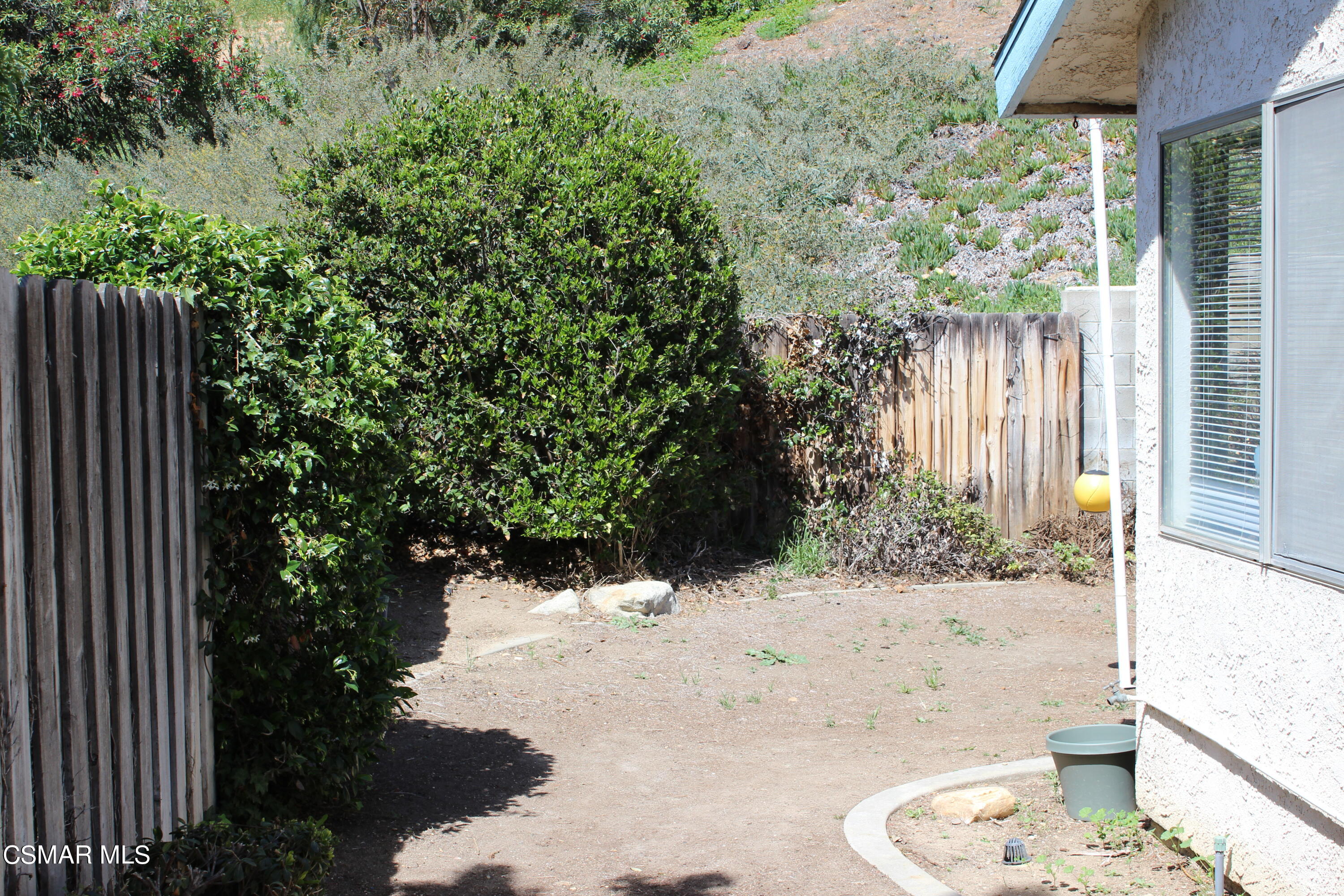 15063 Reedley Street Moorpark, CA 93021 - Photo 16 of 18 a view of a backyard of the house
