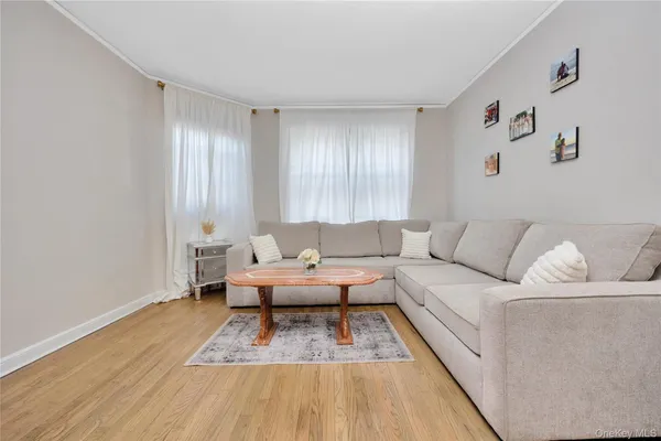 a living room with furniture and a couch