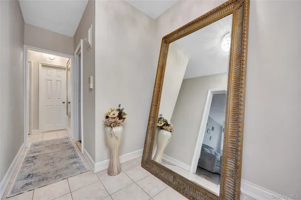a kitchen with stainless steel appliances granite countertop a stove and a microwave