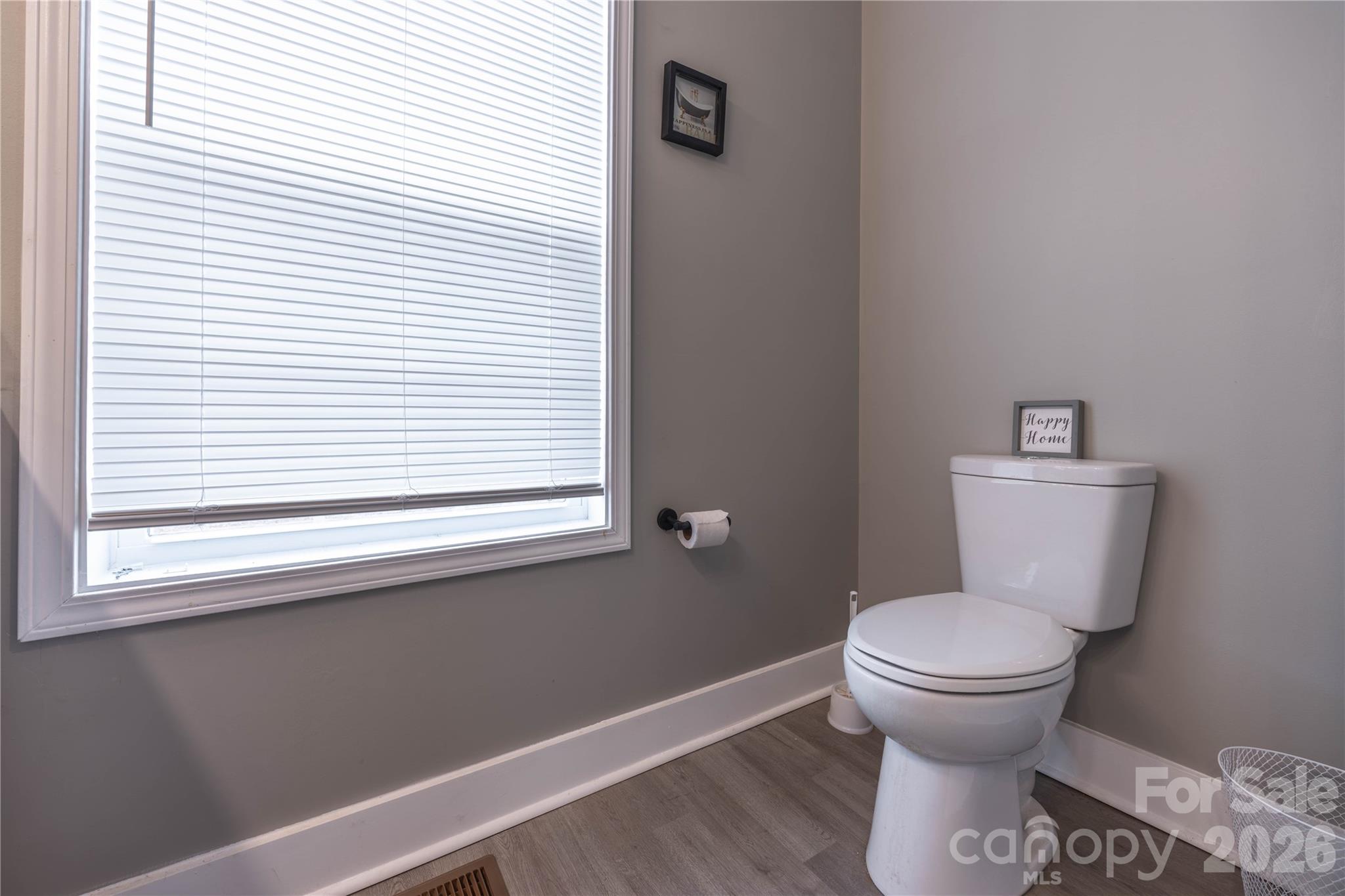 245 John Cline Road Cherryville, NC 28021 - Photo 15 of 29 a bathroom with a toilet and a window