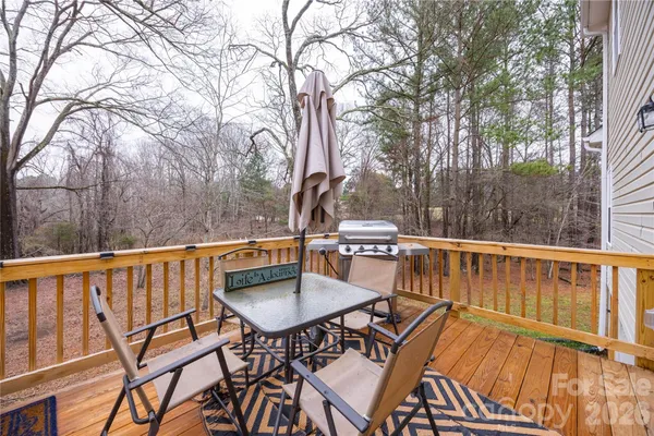 a view of a yard with a tree