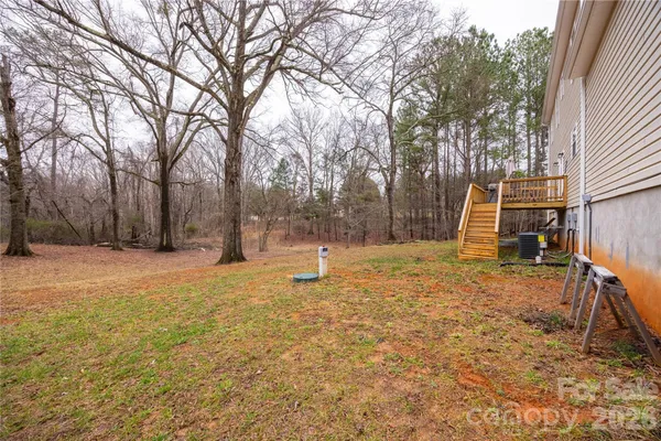 a house view with a backyard space