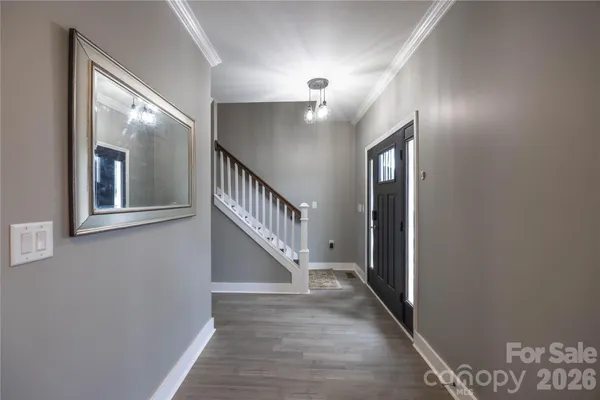 a view of a hallway with entryway