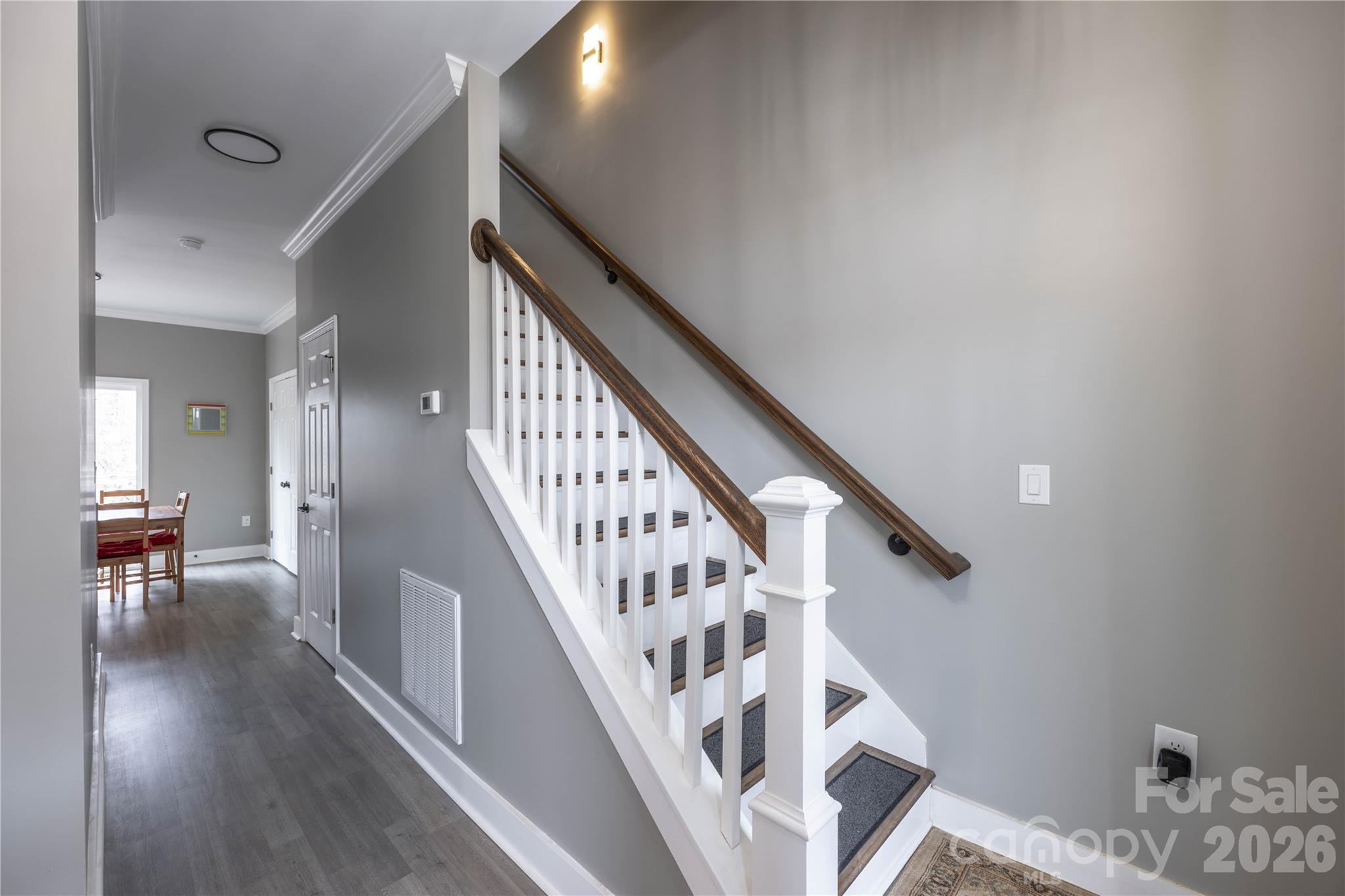 245 John Cline Road Cherryville, NC 28021 - Photo 4 of 29 a view of staircase with wooden floor and a chandelier