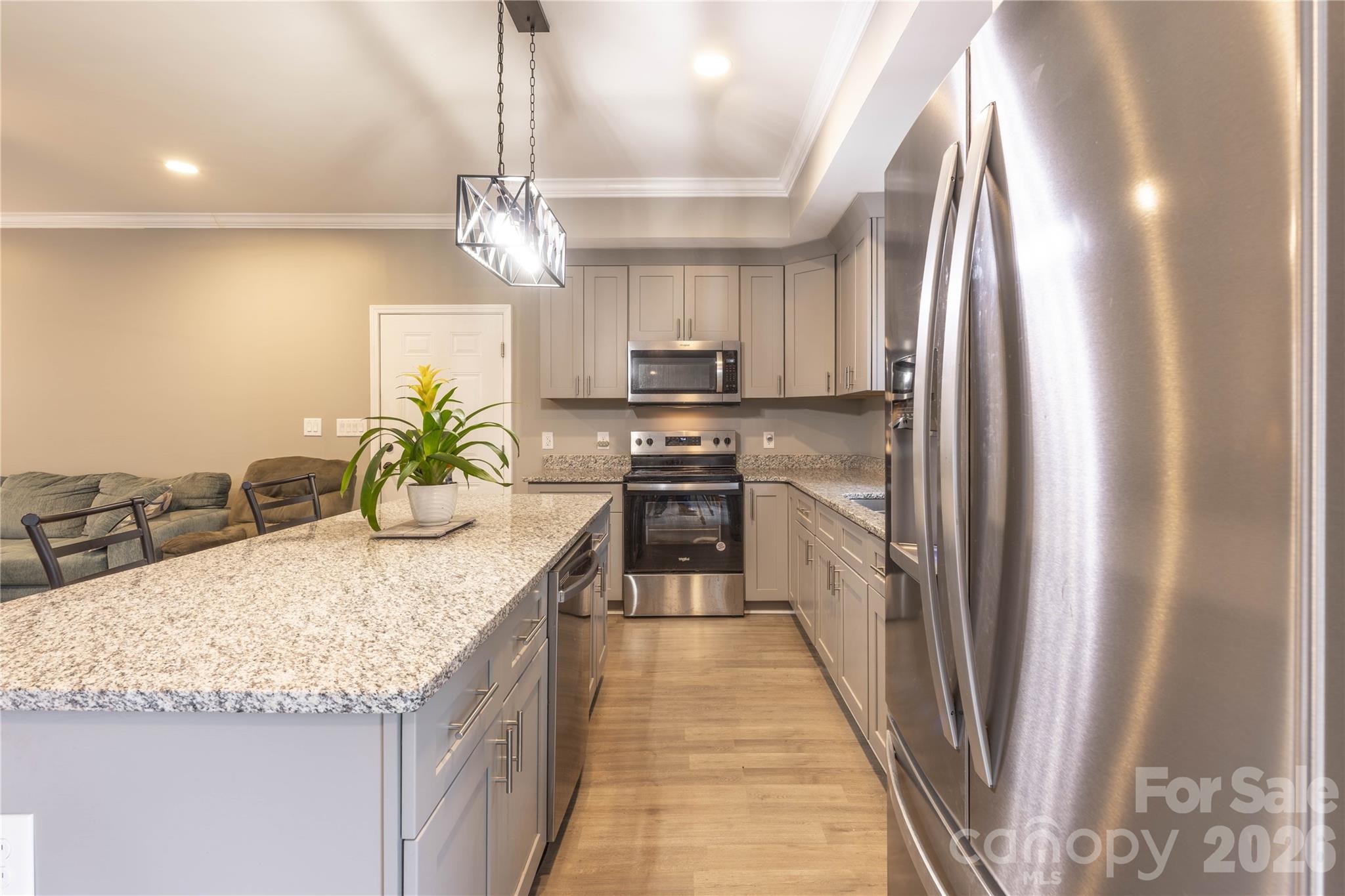 245 John Cline Road Cherryville, NC 28021 - Photo 9 of 29 a kitchen with stainless steel appliances granite countertop sink stove and refrigerator