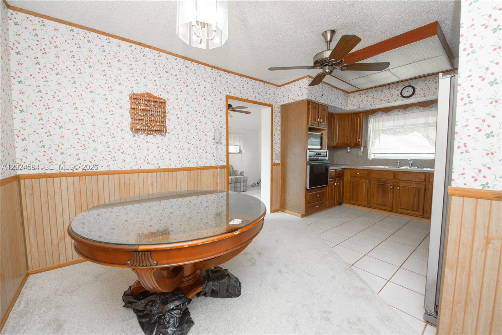 17355 Southwest 256th Street Homestead, FL 33031 - Photo 20 of 32 a room with furniture and window