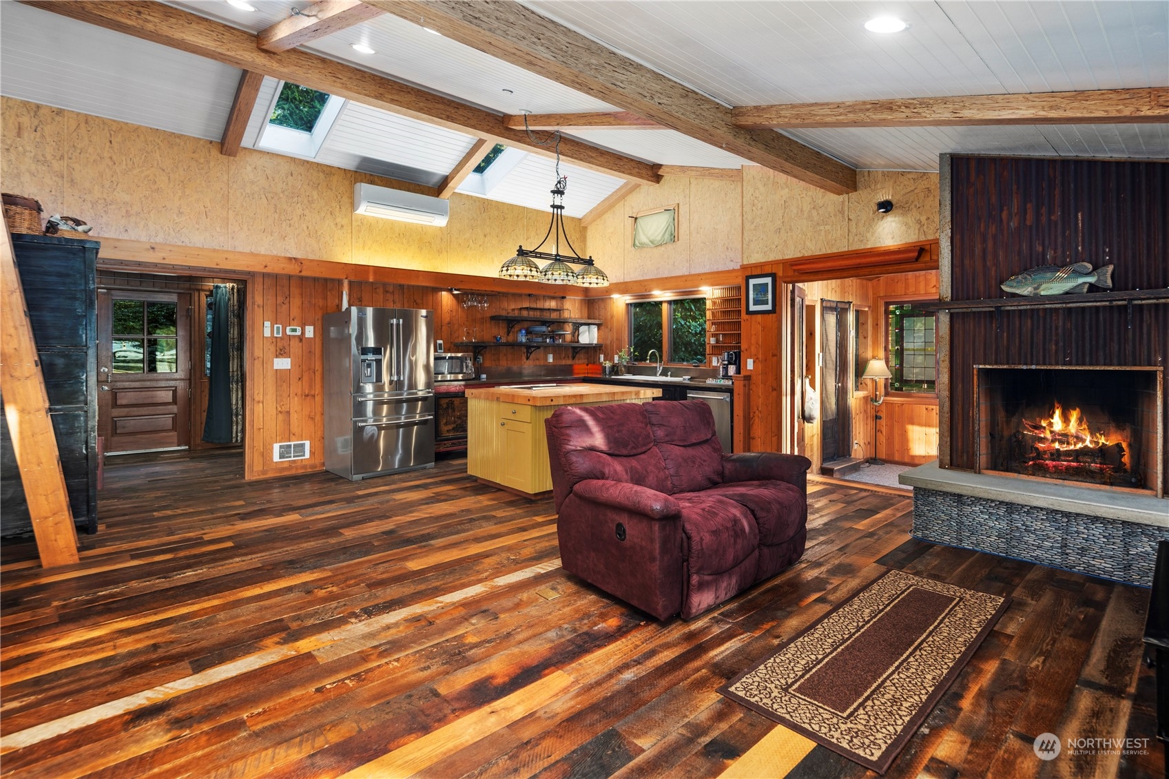 620 South Tulloch Road Snohomish, WA 98290 - Photo 12 of 38 a living room with furniture and a fireplace