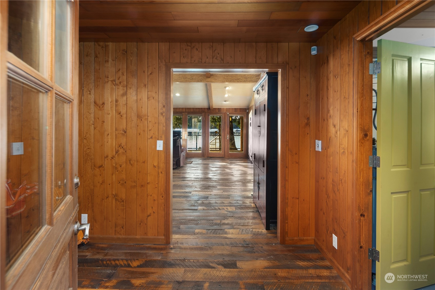 620 South Tulloch Road Snohomish, WA 98290 - Photo 19 of 38 a view of a hallway with wooden floor and a bathroom