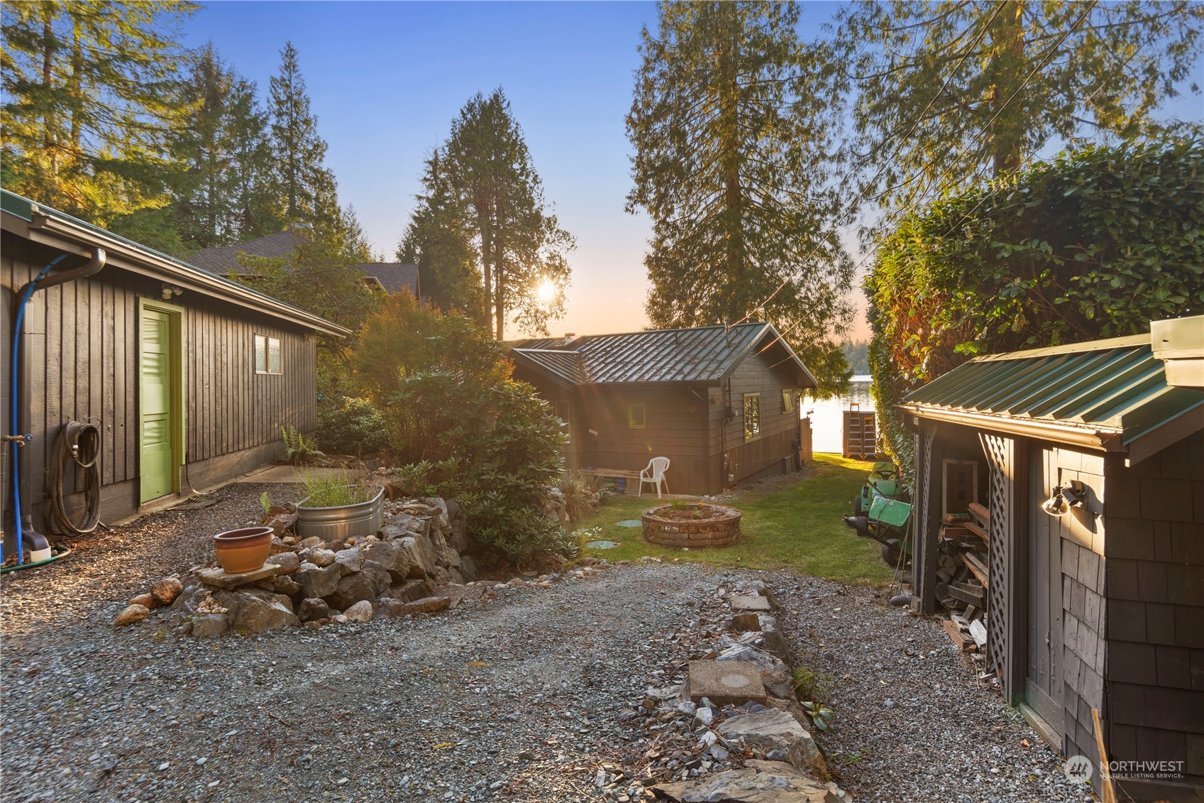 620 South Tulloch Road Snohomish, WA 98290 - Photo 34 of 38 a backyard of a house with barbeque oven and outdoor seating