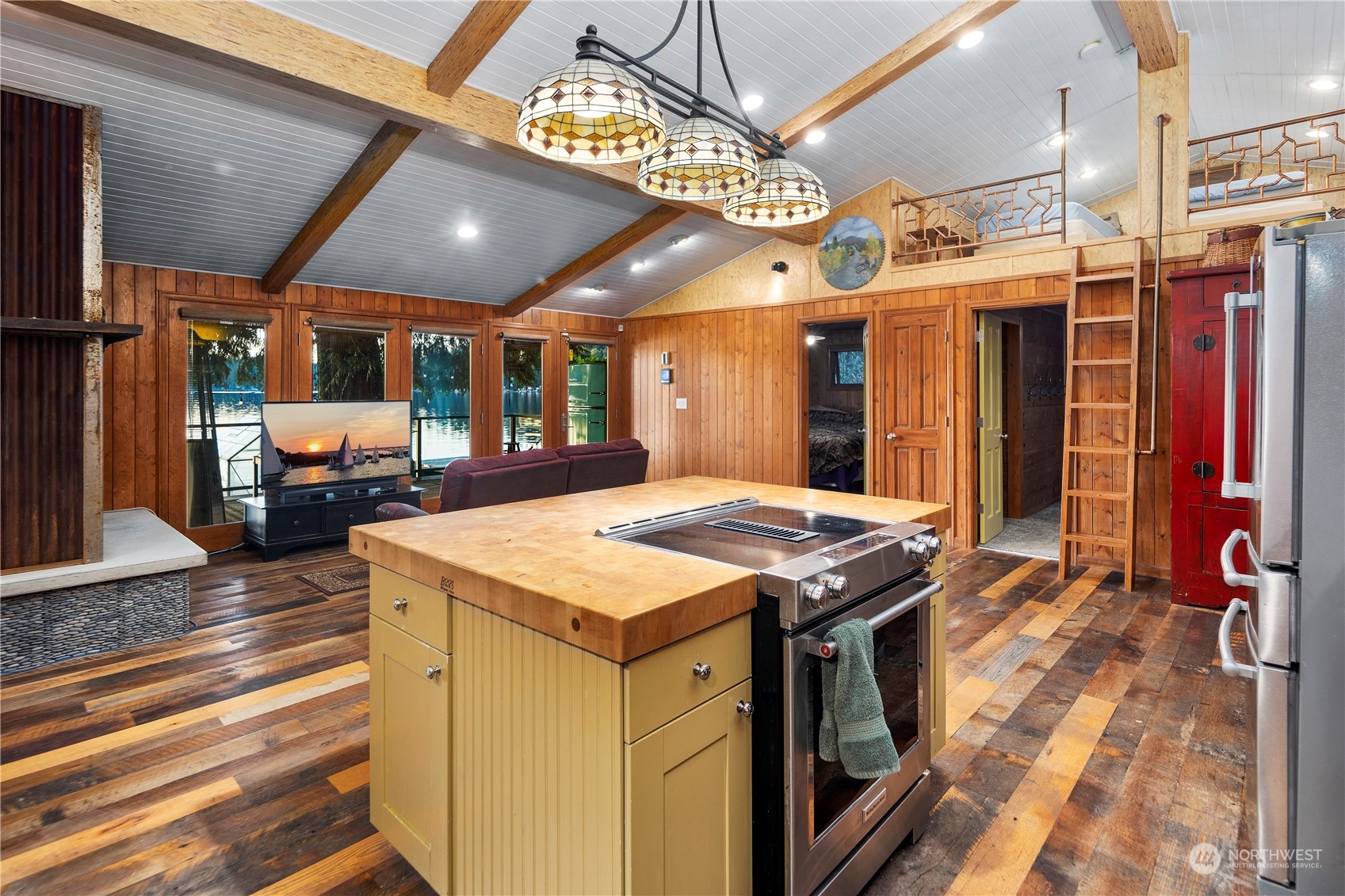 620 South Tulloch Road Snohomish, WA 98290 - Photo 6 of 38 a view of a kitchen with a sink and wooden floor