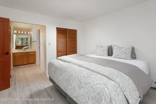 a view of a room that has a window in it