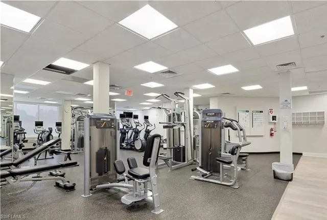 a lobby with furniture and a large window