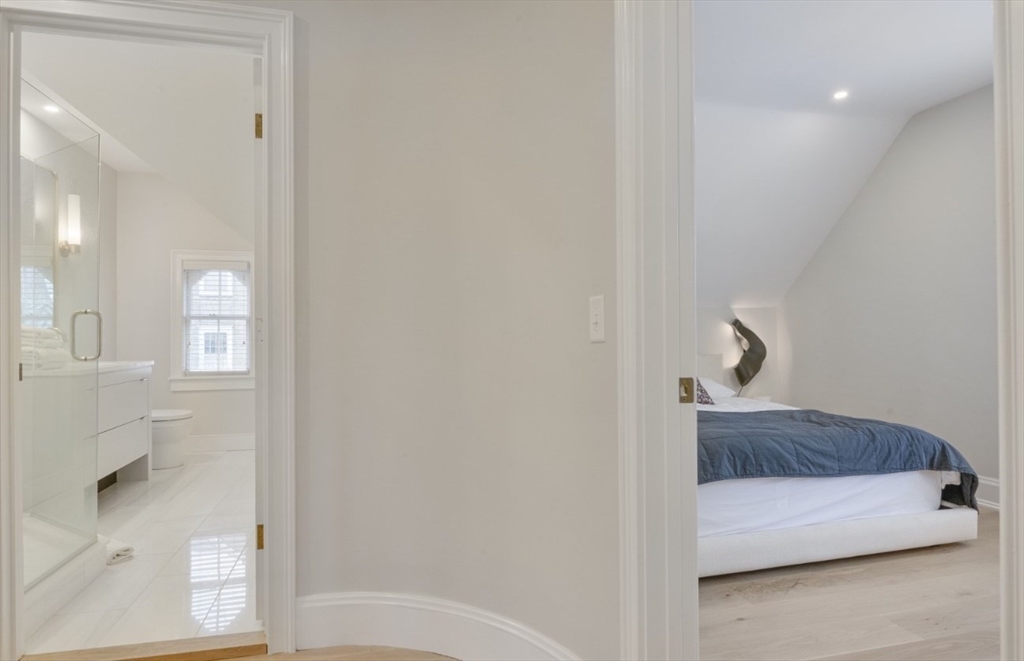 51 Fair Street Nantucket, MA 02554 - Photo 12 of 24 a bathroom with a bathtub and a shower