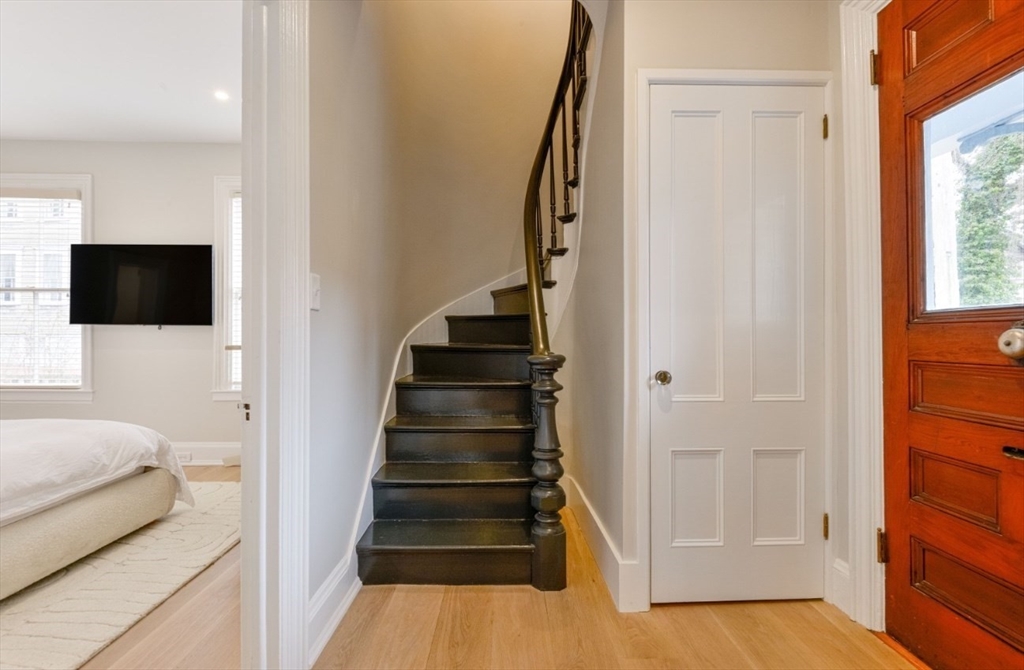 51 Fair Street Nantucket, MA 02554 - Photo 17 of 24 a view of a livingroom from a hallway