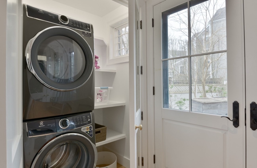 51 Fair Street Nantucket, MA 02554 - Photo 18 of 24 a utility room with dryer and washer