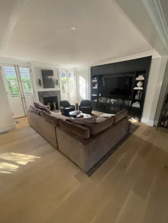 51 Fair Street Nantucket, MA 02554 - Photo 5 of 24 a living room with furniture and a flat screen tv