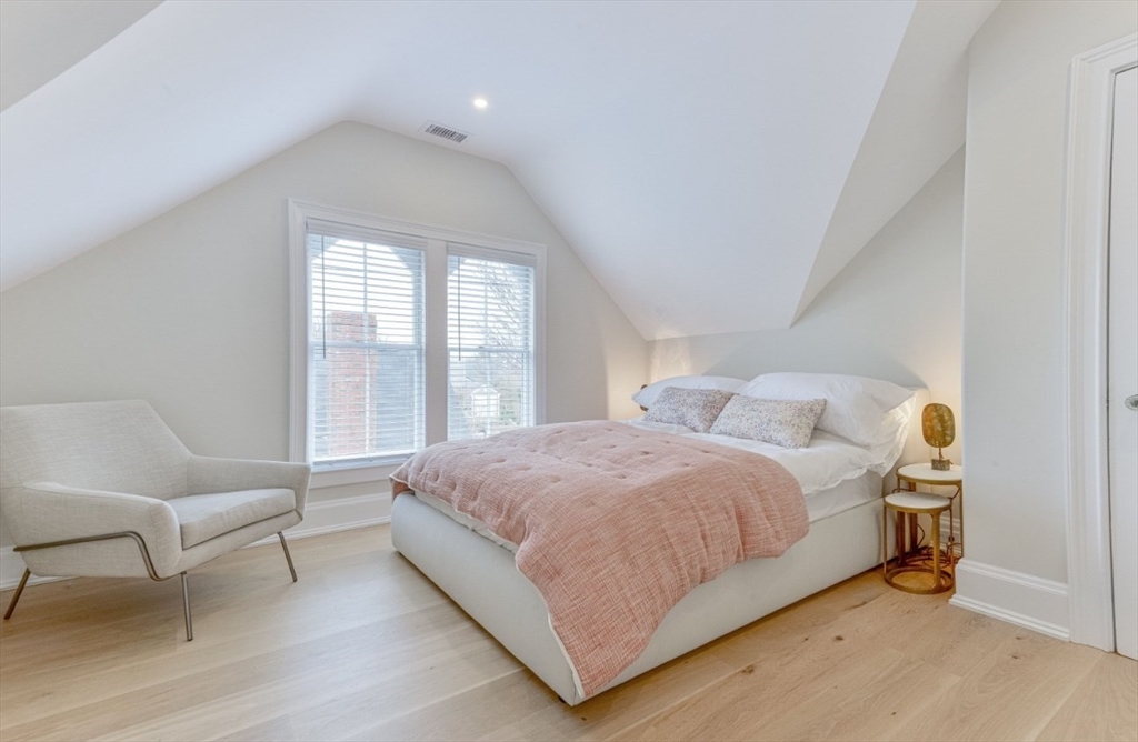 51 Fair Street Nantucket, MA 02554 - Photo 10 of 24 a bedroom with a bed and a couch