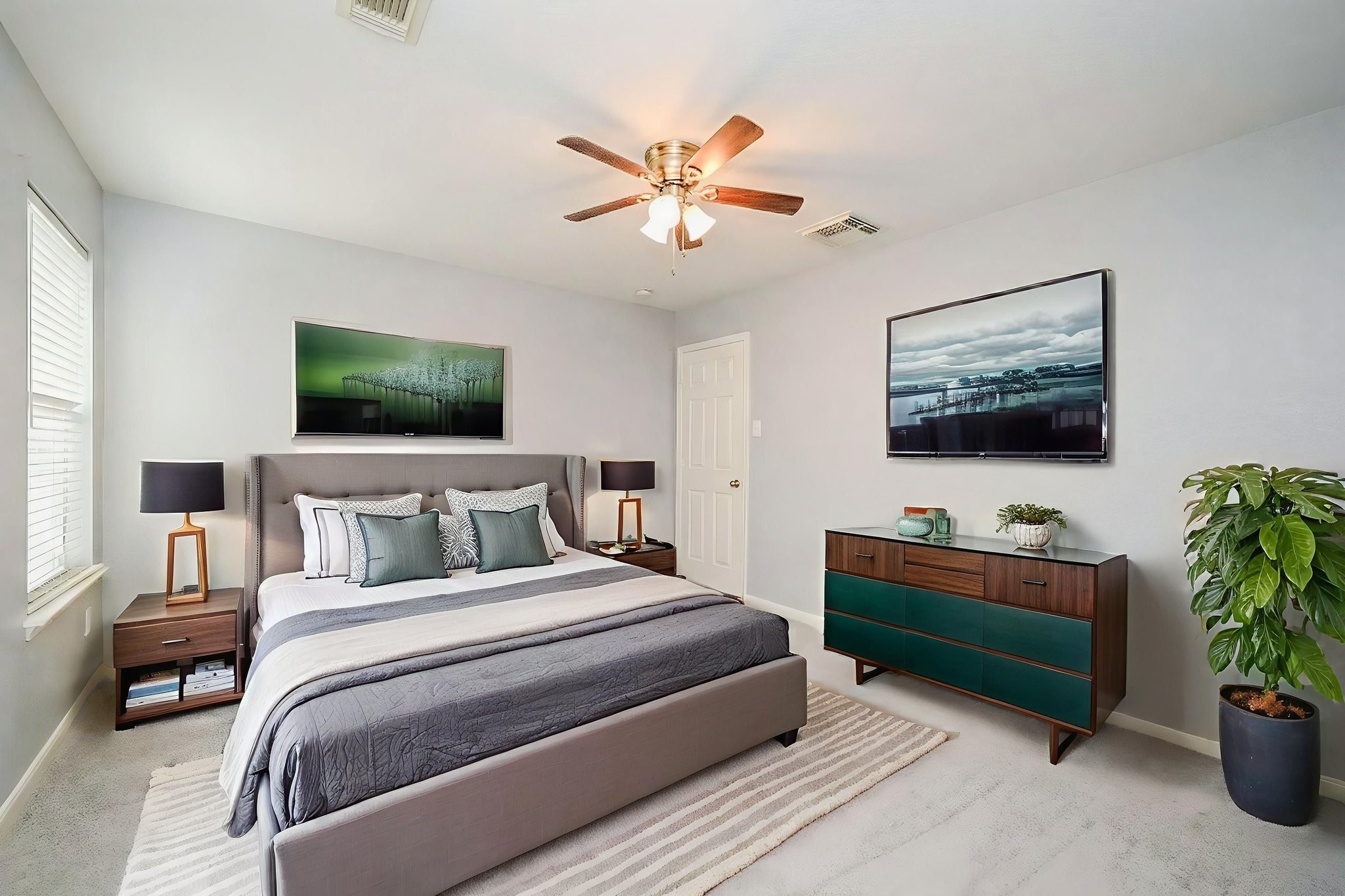 6638 Autumn Sunset Lane Spring, TX 77379 - Photo 23 of 32 Elegant and spacious, this virtually staged bedroom offers a serene retreat perfect for relaxation or hosting guests.