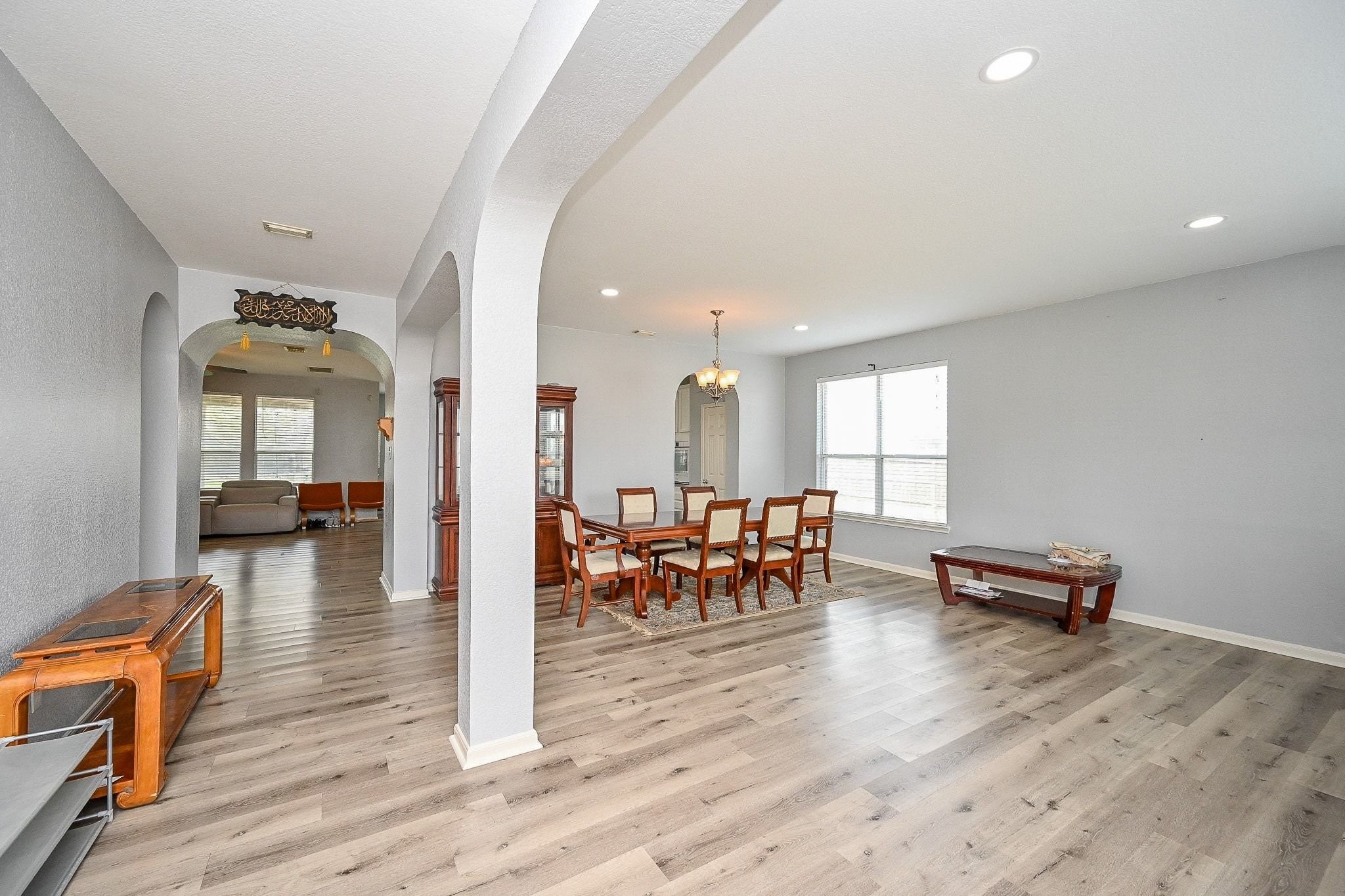 6638 Autumn Sunset Lane Spring, TX 77379 - Photo 7 of 32 Spacious open-concept living and dining area, perfect for entertaining and family gatherings.