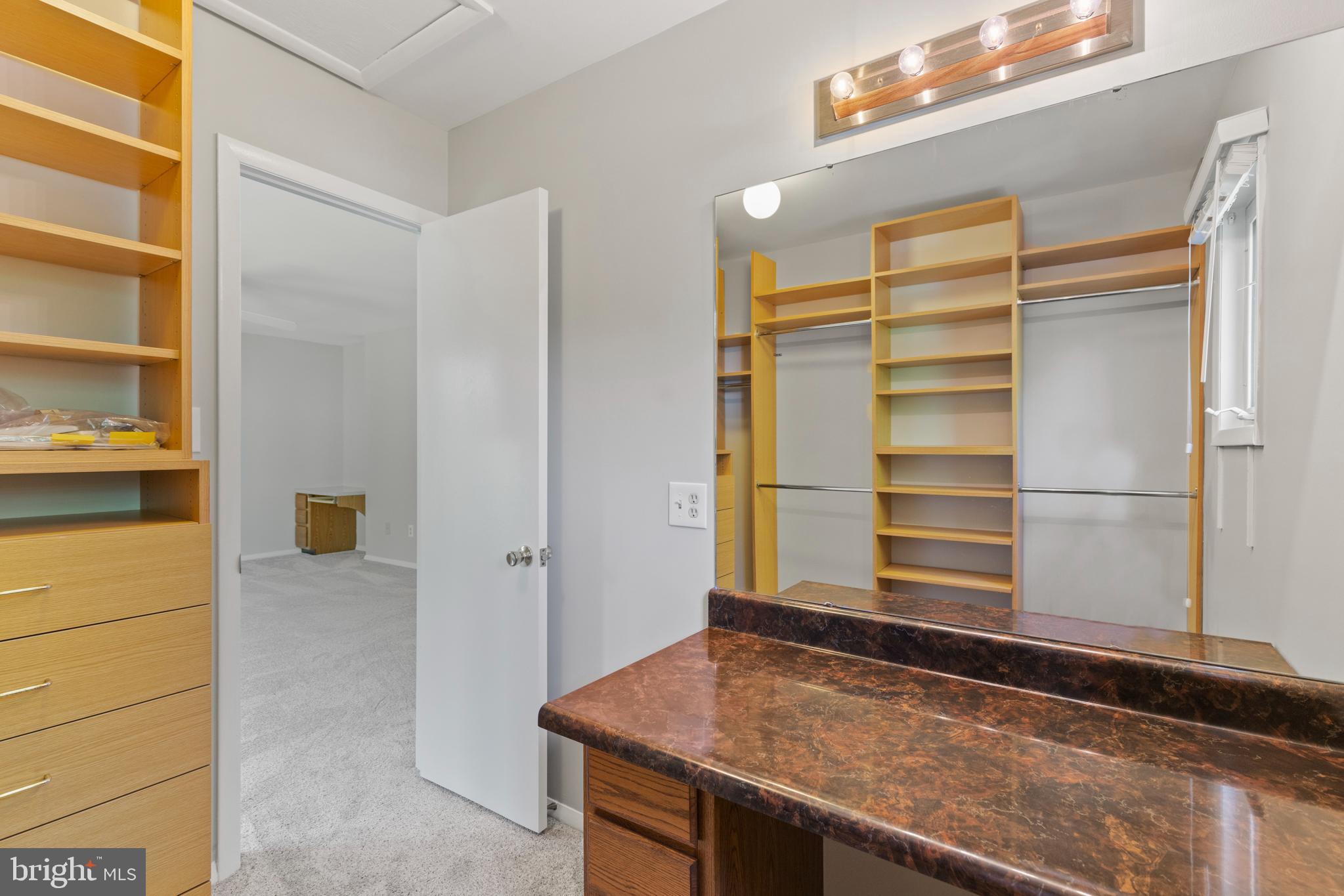 1921 Dundee Road Rockville, MD 20850 - Photo 18 of 41 Walk-in Closet/Dressing Area with Make-up vanity