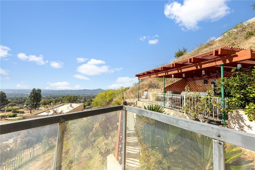 591 Devonwood Road Altadena, CA 91001 - Photo 32 of 35 a view of a swimming pool with an outdoor seating