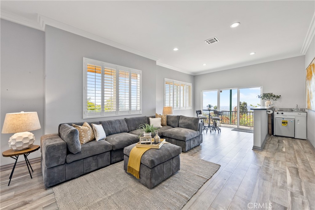 591 Devonwood Road Altadena, CA 91001 - Photo 6 of 35 a living room with furniture and a large window