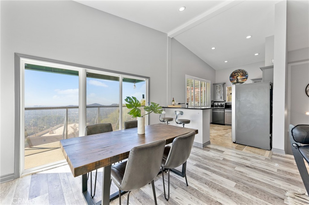 591 Devonwood Road Altadena, CA 91001 - Photo 10 of 35 a view of a dining room with furniture and a potted plant