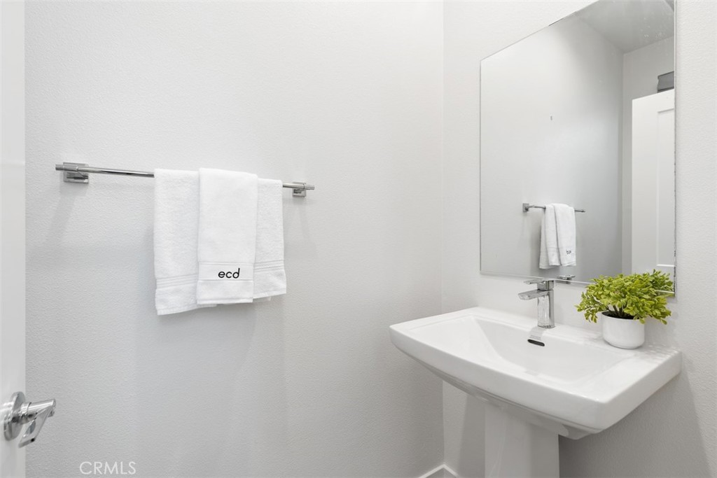 155 Fable Irvine, CA 92618 - Photo 25 of 41 a bathroom with a sink and a mirror