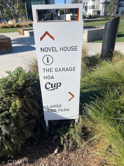 155 Fable Irvine, CA 92618 - Photo 37 of 41 a sign of golf club on a wall under a tree