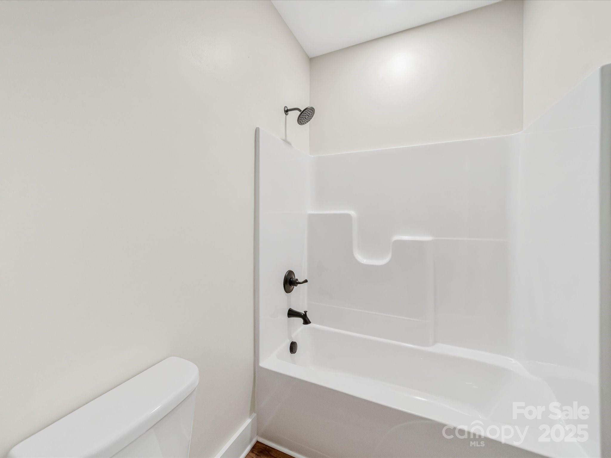 110 Rupard Road Statesville, NC 28625 - Photo 24 of 45 a bathroom with a shower and a toilet