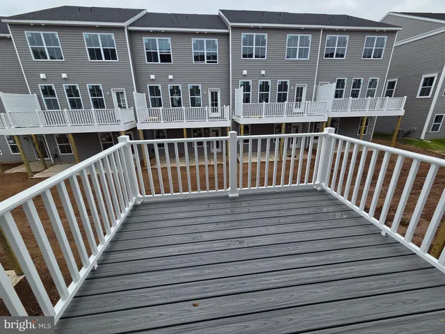 a view of a brick building from a balcony