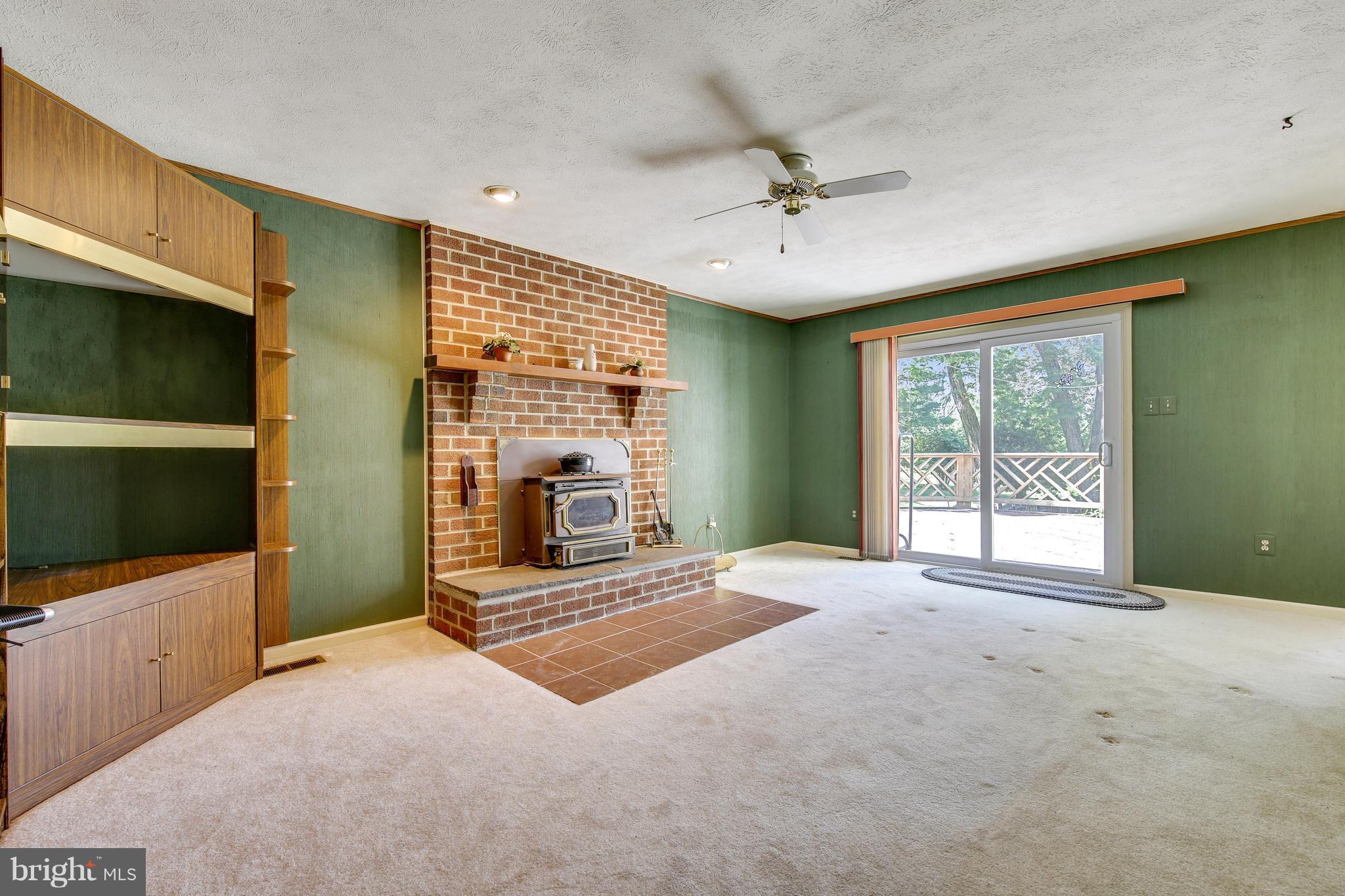 14532 Pebblestone Drive Silver Spring, MD 20905 - Photo 12 of 30 Family Room with Wood burning Stove