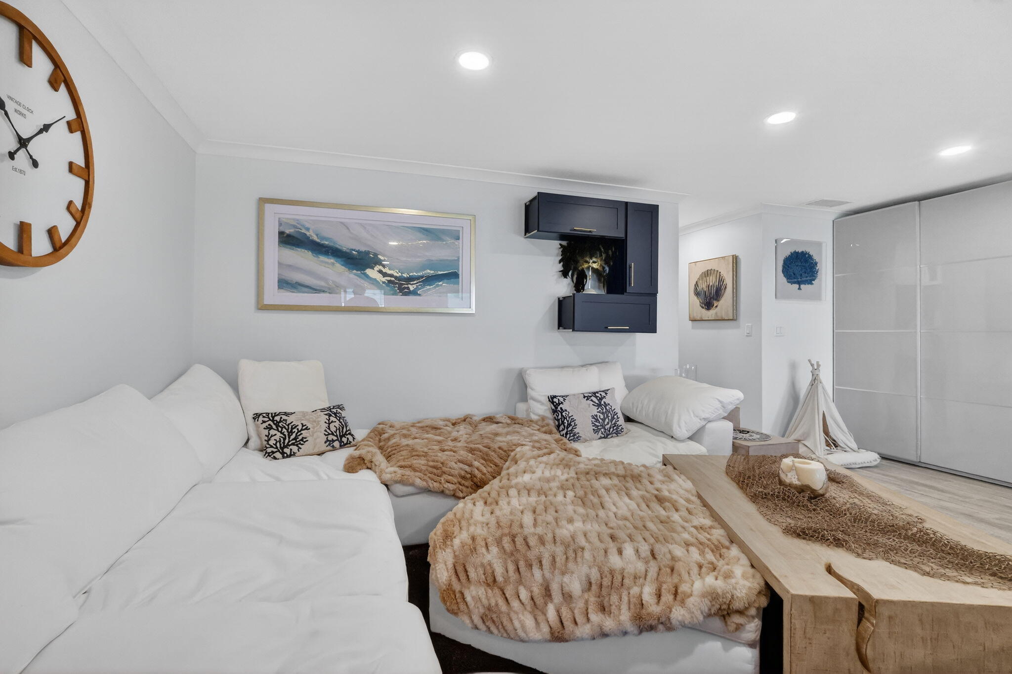 212 West High Point Terrace, Unit C Delray Beach, FL 33445 - Photo 13 of 35 a bedroom with a bed and a painting on the wall