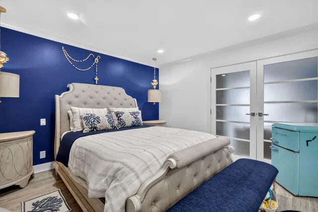 a bedroom with a bed and a cabinets