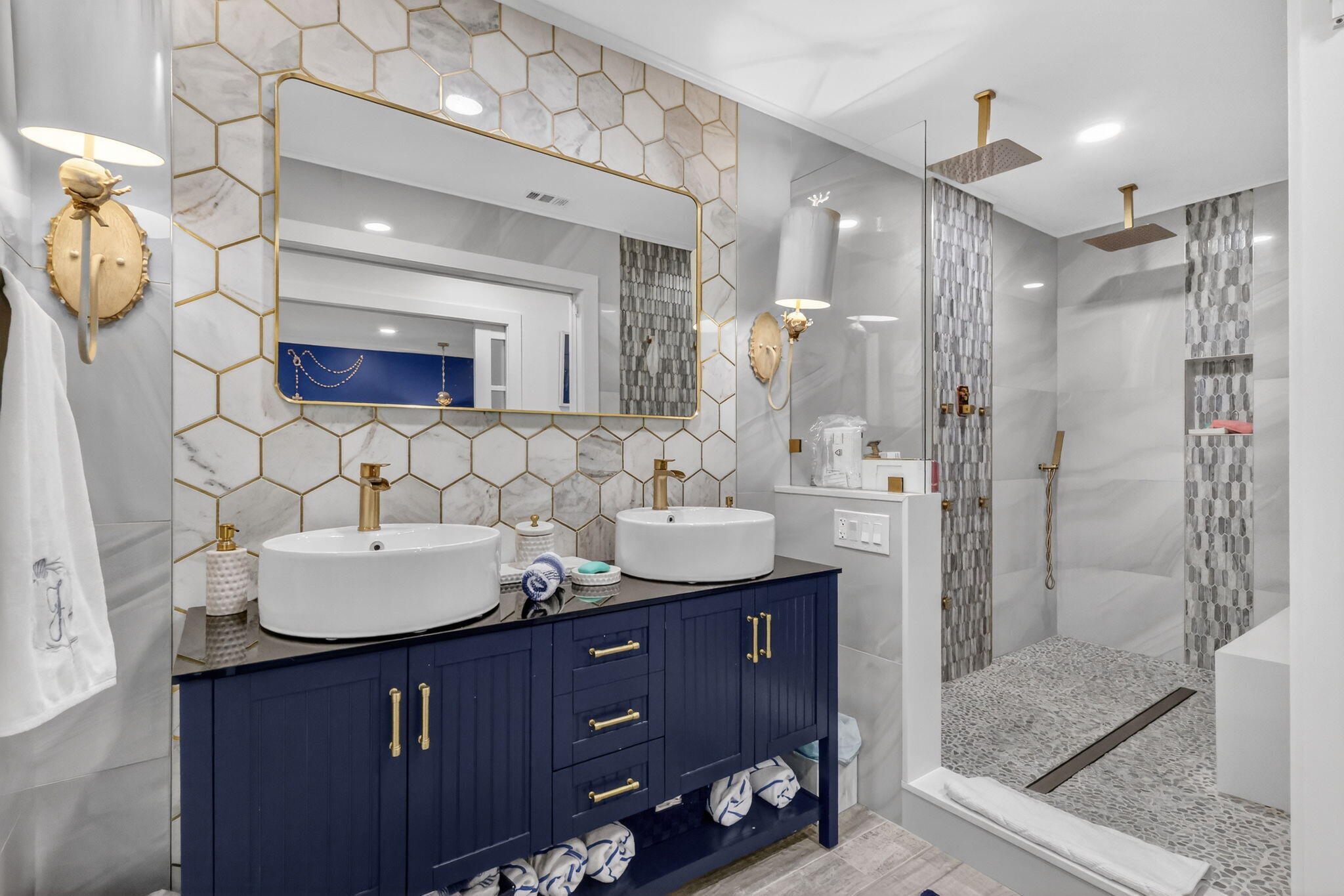 212 West High Point Terrace, Unit C Delray Beach, FL 33445 - Photo 27 of 35 a bathroom with a sink double vanity and a mirror