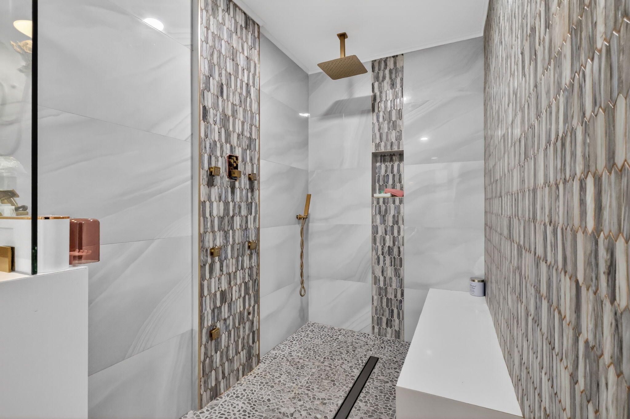 212 West High Point Terrace, Unit C Delray Beach, FL 33445 - Photo 28 of 35 a bathroom with a shower