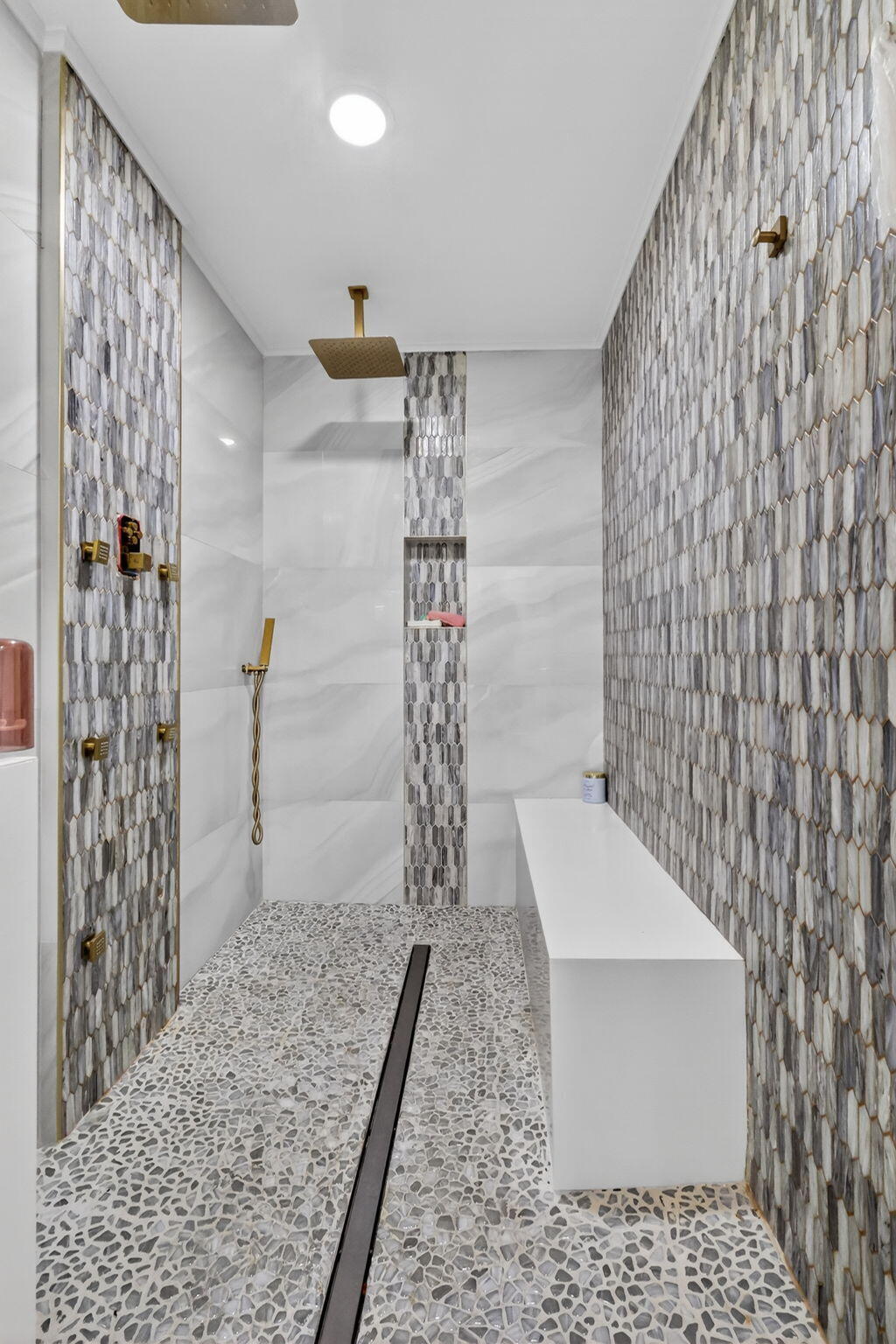 212 West High Point Terrace, Unit C Delray Beach, FL 33445 - Photo 29 of 35 a bathroom with a shower