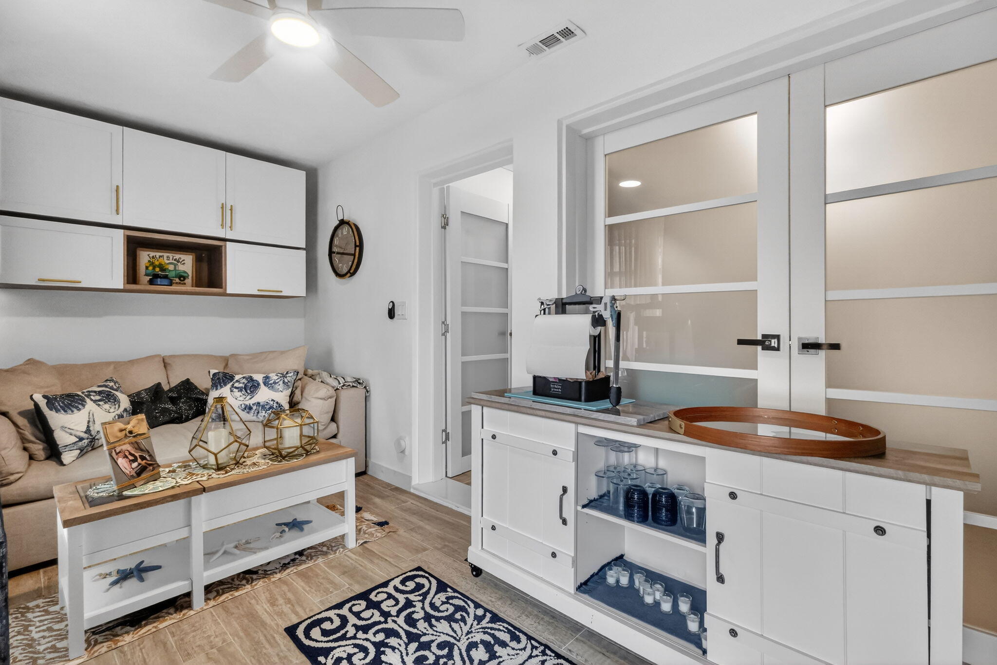 212 West High Point Terrace, Unit C Delray Beach, FL 33445 - Photo 32 of 35 a kitchen with white cabinets and window