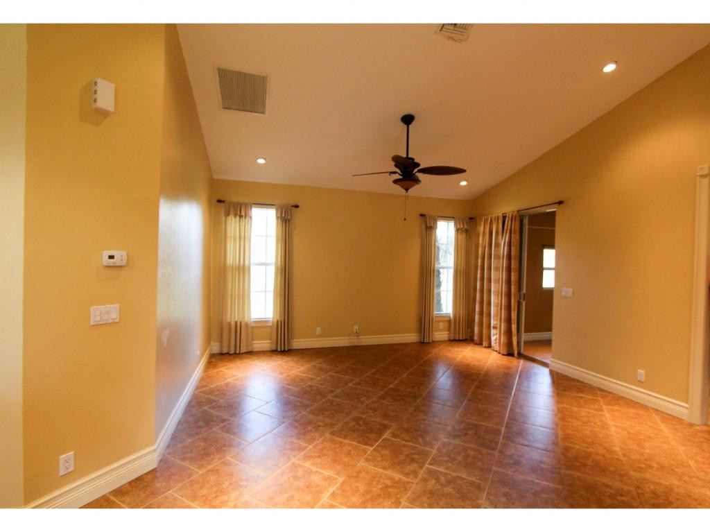 4125 13th Avenue Southwest Naples, FL 34116 - Photo 21 of 34 a view of a hallway with a window