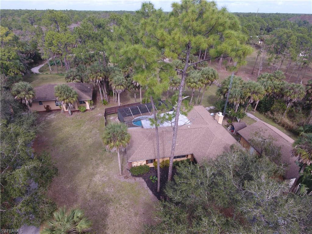 4125 13th Avenue Southwest Naples, FL 34116 - Photo 32 of 34 an aerial view of a house with a yard