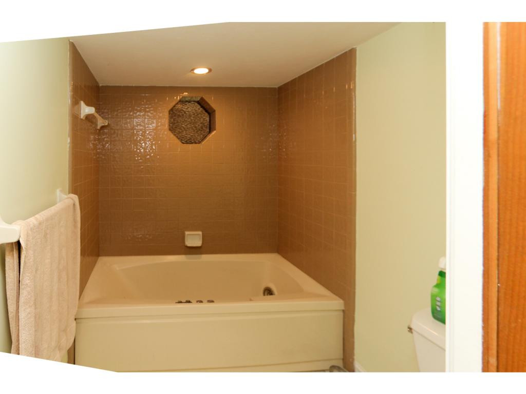 4125 13th Avenue Southwest Naples, FL 34116 - Photo 10 of 34 a bathroom with a shower