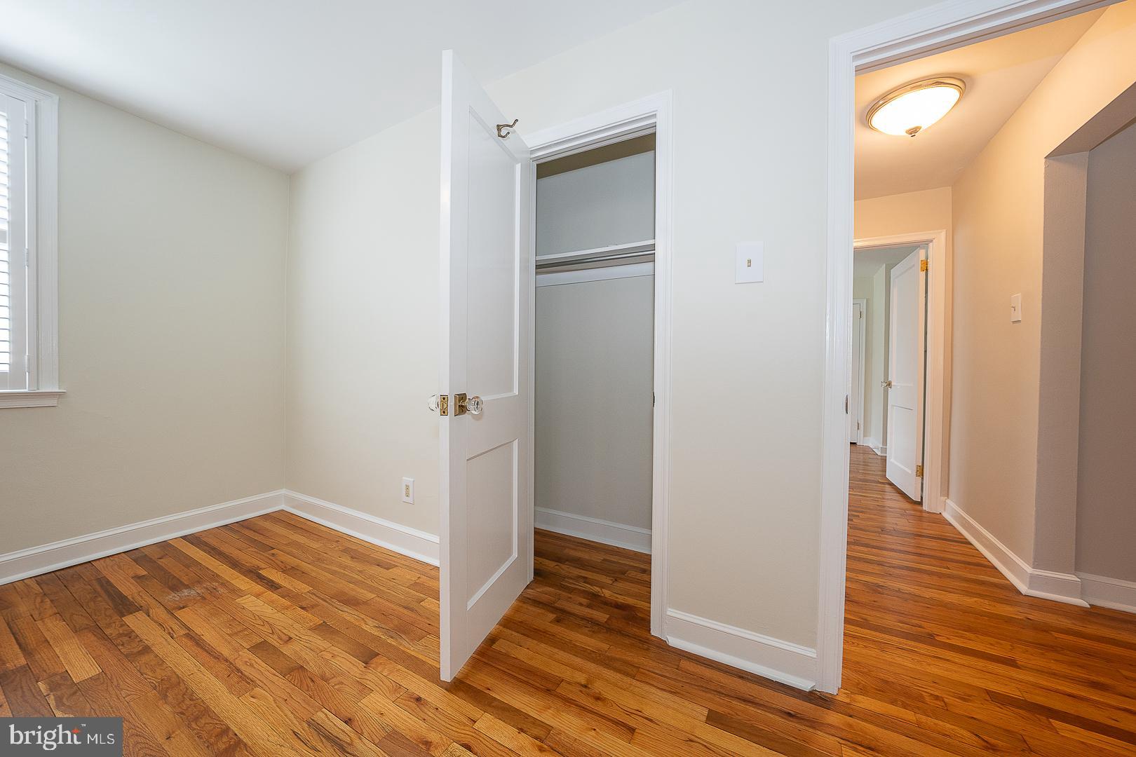 500 East Lancaster Avenue, Unit 111A Wayne, PA 19087 - Photo 19 of 43 a view of an empty room with wooden floor