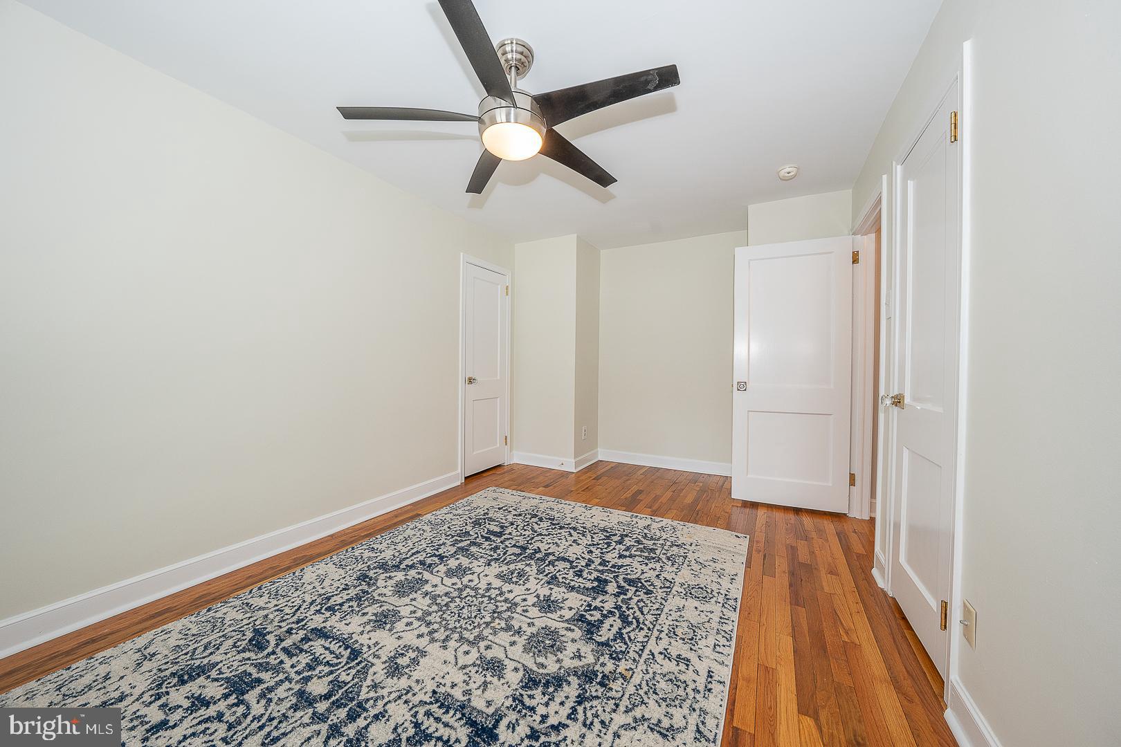 500 East Lancaster Avenue, Unit 111A Wayne, PA 19087 - Photo 21 of 43 wooden floor in an empty room