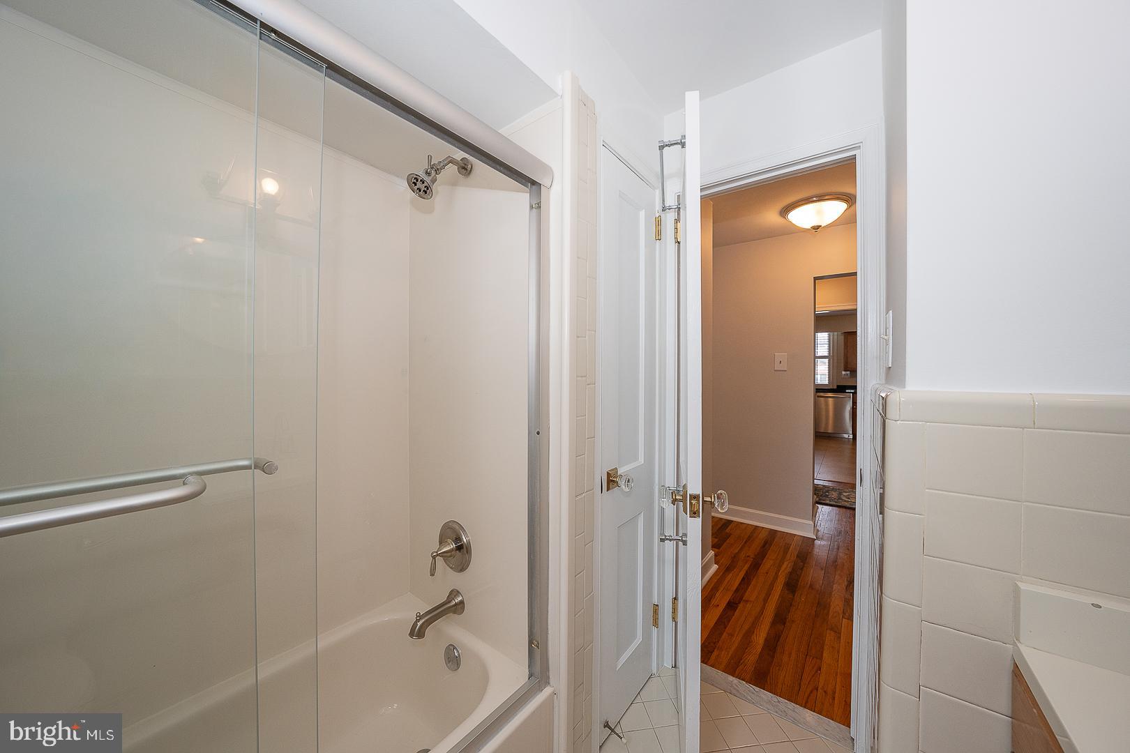 500 East Lancaster Avenue, Unit 111A Wayne, PA 19087 - Photo 26 of 43 a bathroom with a tub and shower