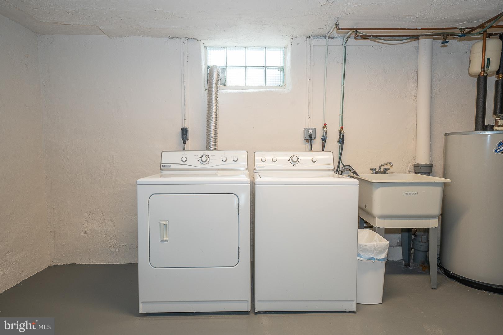 500 East Lancaster Avenue, Unit 111A Wayne, PA 19087 - Photo 31 of 43 a utility room with dryer and washer