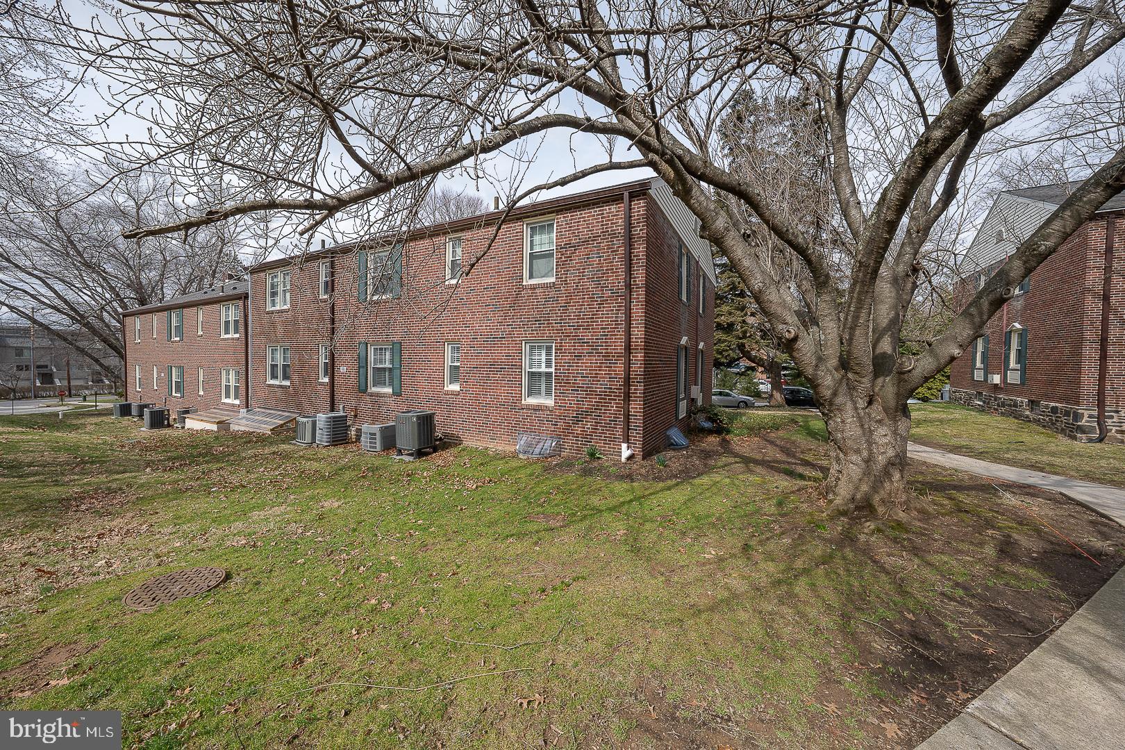 500 East Lancaster Avenue, Unit 111A Wayne, PA 19087 - Photo 36 of 43 a backyard of a house with lots of green space