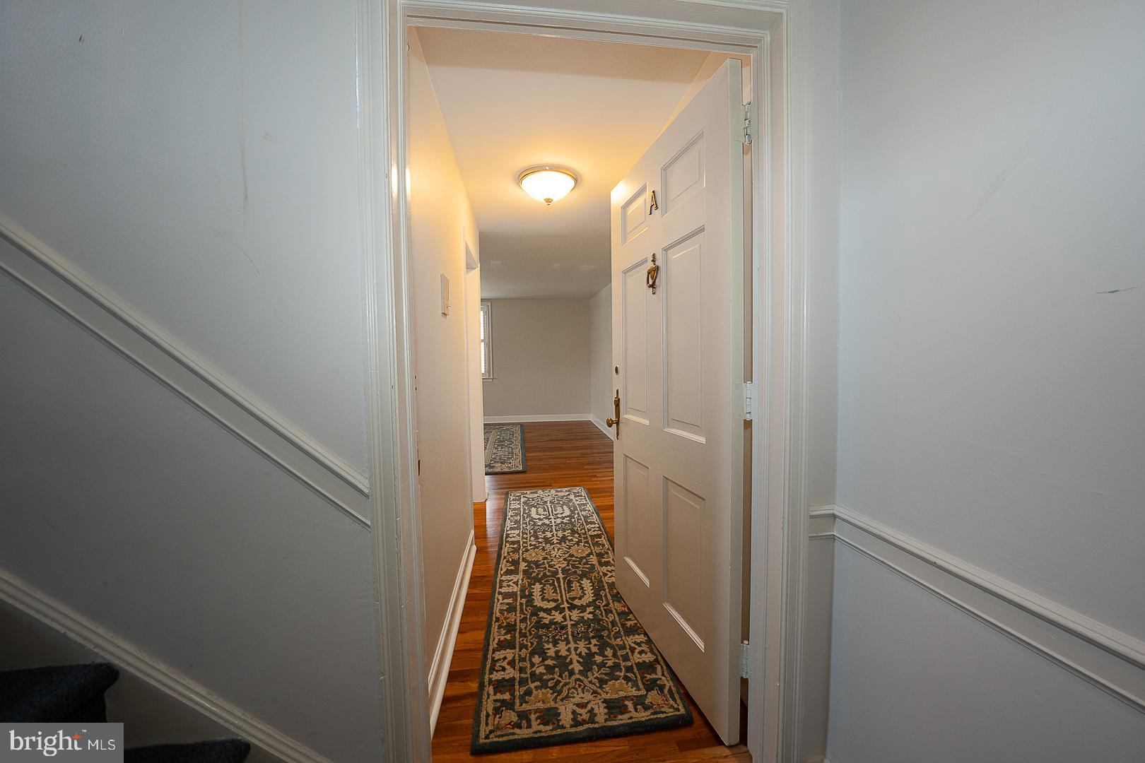 500 East Lancaster Avenue, Unit 111A Wayne, PA 19087 - Photo 4 of 43 a view of a bathroom from a hallway